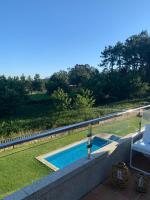 "SANXENXO HOLIDAYS" ATICO CON BARBACOA PRIVADA, PISCINA y GARAJE EN EL CENTRO - B&B Sanxenxo