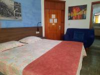 Quarto Deluxe (2 Adultos + 1 Criança)