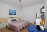 Doppel- oder Zweibettzimmer