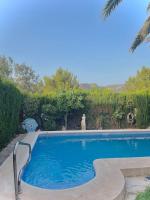 Maison cosy au pied du golf avec piscine privée - B&B Muntanya la Sella