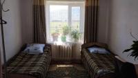 Zweibettzimmer mit Bergblick