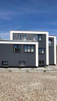 Apartamenty Skórzewo-Lotnisko MTP Tor Poznań - Chambres d'hôtes Skórzewo