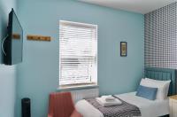 Tweepersoonskamer met 2 Aparte Bedden en Badkamer