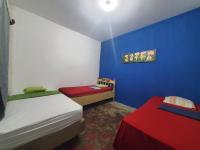 Habitación Triple Básica con baño compartido