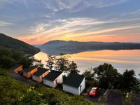 Knotty Pine Cottages, Suites & Motel Rooms - Chambres d’hôtes Ingonish Beach