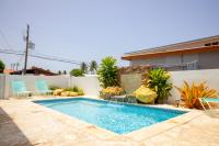 R&V Combate Beach House, 2nd Floor with Pool - Ferienwohnung