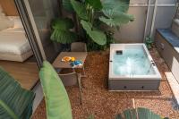 Apartment mit 1 Schlafzimmer, eigenem Garten und Whirlpool