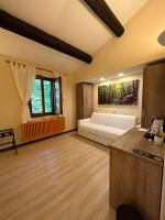 Camera Quadrupla Superior