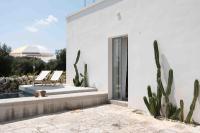 Alloggio nei Trulli della Masseria Collina Casanoja - Chambres d’hôtes Noci
