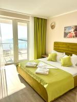 Suite mit Kingsize-Bett und Balkon