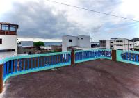 Apartment in San Cristóbal with 2 Bedrooms, 6 Beds, Living Room, Dining Room, Kitchen, Private Balcony, Terrace with Ocean View, Washer, Satellite Internet, Near Bars and Restaurants - Blue Horizon - Galápagos Home - Chambres d'hôtes Puerto Baquerizo Moreno