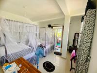 Dreibettzimmer mit Bergblick