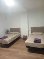 Dreibettzimmer mit Gemeinschaftsbad