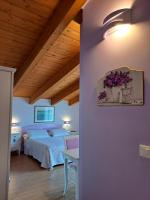 Chambre Quadruple avec Salle de Bains Privative