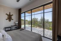 Suite met Kingsize Bed en Uitzicht op Zee