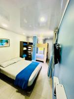 Camera Deluxe con 2 Letti Matrimoniali 