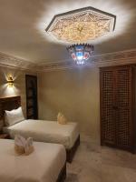 Chambre Quadruple avec Accès au Hammam