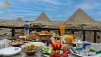 B&B Cairo - Sunrise Pyramids View Inn - Bed and Breakfast Cairo