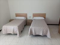 Camera Tripla con Bagno in Comune