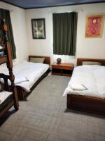 Camera Familiare con Bagno in Comune