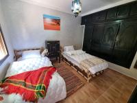 Single Bed in Dormitory Room