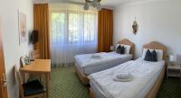 Tweepersoonskamer met 2 Aparte Bedden