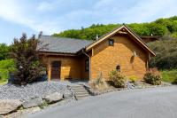 5 Sterne Ferienhaus Tommy mit Kamin, Seeblick und großer Terrasse - Chambres d'hôtes Rieden