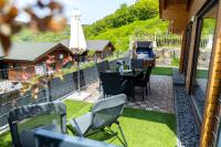 5 Sterne Ferienhaus Annika mit Kamin, Seeblick und großer Terrasse - Chambres d’hôtes Rieden