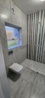 Zimmer mit Queensize-Bett und Gartenblick