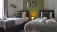 Emerald House - TV in every bedroom! - Chambres d’hôtes
