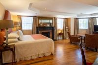 Deluxe Zimmer Emma Kelly mit Kingsize-Bett