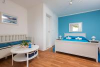 Doppelzimmer mit Balkon und Meerblick
