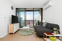 Resort-style Docklands Riverview Stay with Parking - Chambres d’hôtes Melbourne