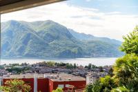 Miravalle Lakeview by Quokka 360 - Bright Apartment with Large Windows and Stunning Lake Views - Ferienwohnung Massagno