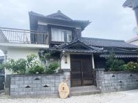 角島シェア&ゲストハウスSumikkoオーシャンビューの犬がいるゲストハウスで特別な交流体験個室とドミトリー - B&B Tsunoshima