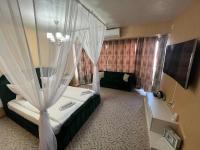 Chambre Lit King-Size avec Baignoire Spa