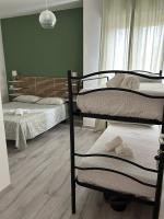 Chambre Quadruple avec Salle de Bains Privative