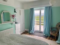 Kamer met Kingsize Bed en Uitzicht op de Tuin