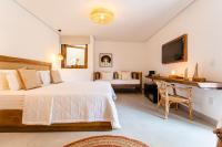 Chambre Deluxe (1 Adulte + 1 Enfant)