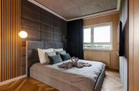 SKY Home- Wood Penthouse -Manufaktura, Parking, Klimatyzacja, Dostęp na Kod - Chambres d'hôtes Łódź