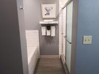 Two-Room King Suite with Walk-In Shower - Disability Access/Non-Smoking