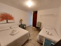 Chambre Triple avec Salle de Bains Privative