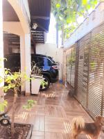 Suit na varanda em Casa Ar e Frigobar - B&B Foz do Iguaçu