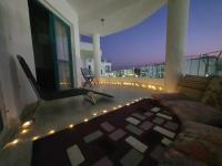 Relaxed sea view chalet - B&B Ra’s Matārimah