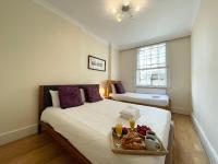 B&B London - Grosvenor Gardens Apartments - Bed and Breakfast London