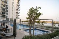 Cowboy Charm 1BR Apartment on Yas Island - B&B