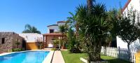Chalet la Huerta con piscina y wifi no grupos - Chambres d'hôtes Conil de la Frontera