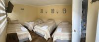 Chambre Quadruple avec Salle de Bains Privative