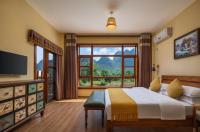 Deluxe Zimmer mit Queensize-Bett und Garten