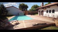 VILLA LA PAVOTTE 4* 11 PERSONNES.PISCINE CHAUFFEE.JACCUZY OPTION. - Chambres d'hôtes Mimizan